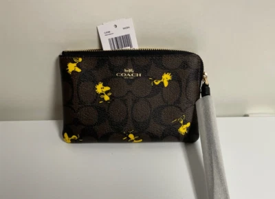 COACH X PEANUTS WOODSTOCK CORNER ZIP WRISTLET SIGNATURE CANVAS C4588 NWT - Image 1 of 2