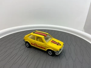 Hot Wheels LEO INDIA FIAT WALT DISNEY WORLD YELLOW W/ RED WRITING RED ARROW - Picture 1 of 6