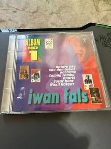 Iwan Fals Album No 1 CD 1990 Indonesia Antara Aku Kau Dan Bekas - Picture 1 of 3
