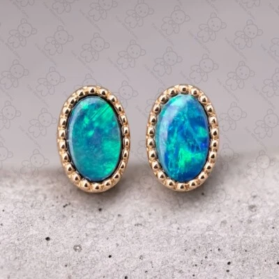 Aretes minimalistas ovalados australianos doblete ópalo oro amarillo de 18 quilates Foto 1 de 4