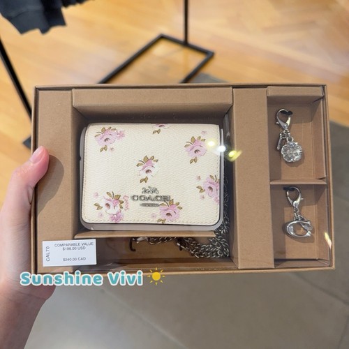 Mini portafoglio Coach nuovo con etichette in scatola su catena con floreale argento gesso multi CAL70