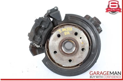 98-05 Mercedes W163 ML320 Buje de nudillo de husillo lateral derecho trasero con pinza de freno Foto 1 de 4