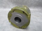 A UNUSED 140mm DIA  x 100 mm  WOOD WORKING MOULDING BLOCK WITH 40mm BORE