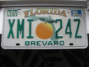 Vintage 1998 FLORIDA BREVARD Orange License Plate XMI 24Z Multi Color - Picture 1 of 4