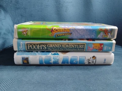SCOOBY-DOO + WINNIE THE POOH + ICE AGE - VHS - CLAMSHELL 3 TAPE LOT!!! Foto 1 de 4