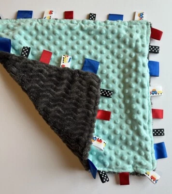 Manta de seguridad etiquetada gris azulado trenes etiquetas tren cintas sensoriales Lovey Foto 1 de 4