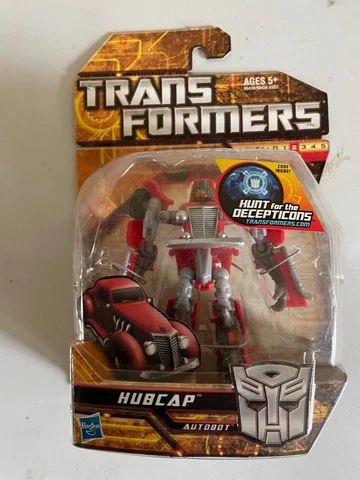 Transformers Hunt for the Decepticons Hubcap in package, never opened Cover