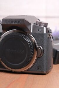 Panasonic LUMIX G7 16MP Digital SLR Micro Four Thirds Camera with Charger