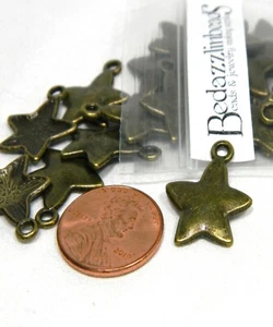 30 Little Puffed 3/4 inch Antique Bronze Metal Star Jewelry Charms w/ 1.5mm Hole - Picture 1 of 2