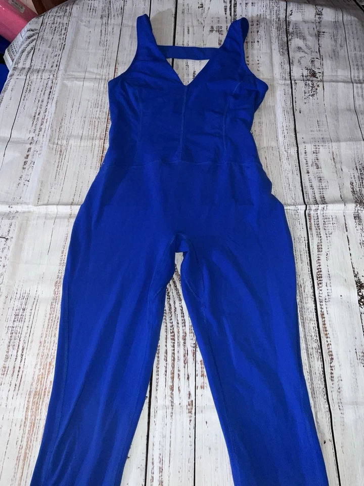 Mono Free People Movement Pirueta Espalda Abierta Pierna Acampanada Azul Medio (275) Foto 1 de 4