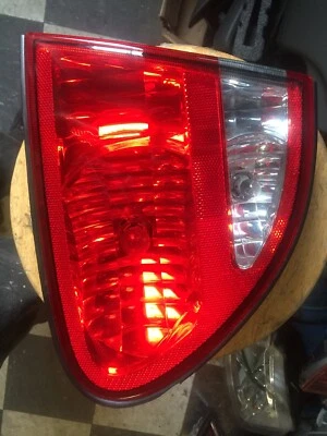 Oldsmobile Alero 1999-2004 fabricante original pasajero derecho tapa luz trasera fábrica #2 Foto 1 de 4