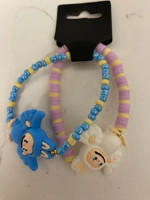 2 Pulseras Monstruo Sonriente - Monstruos Sonrientes con Alas de Ángel - Azul/Blanco Foto 1 de 2