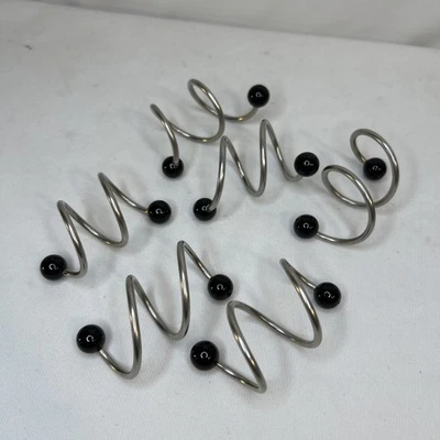 Juego de bobinas de anillo de servilleta negro espiral cromado estilo 6 MCM diámetro 1,25" Foto 1 de 4