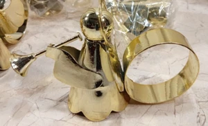 Set 7 anelli tovaglioli ANGELO ORO tromba aureola 67072 vintage anni 90 90 metallo - Foto 1 di 7