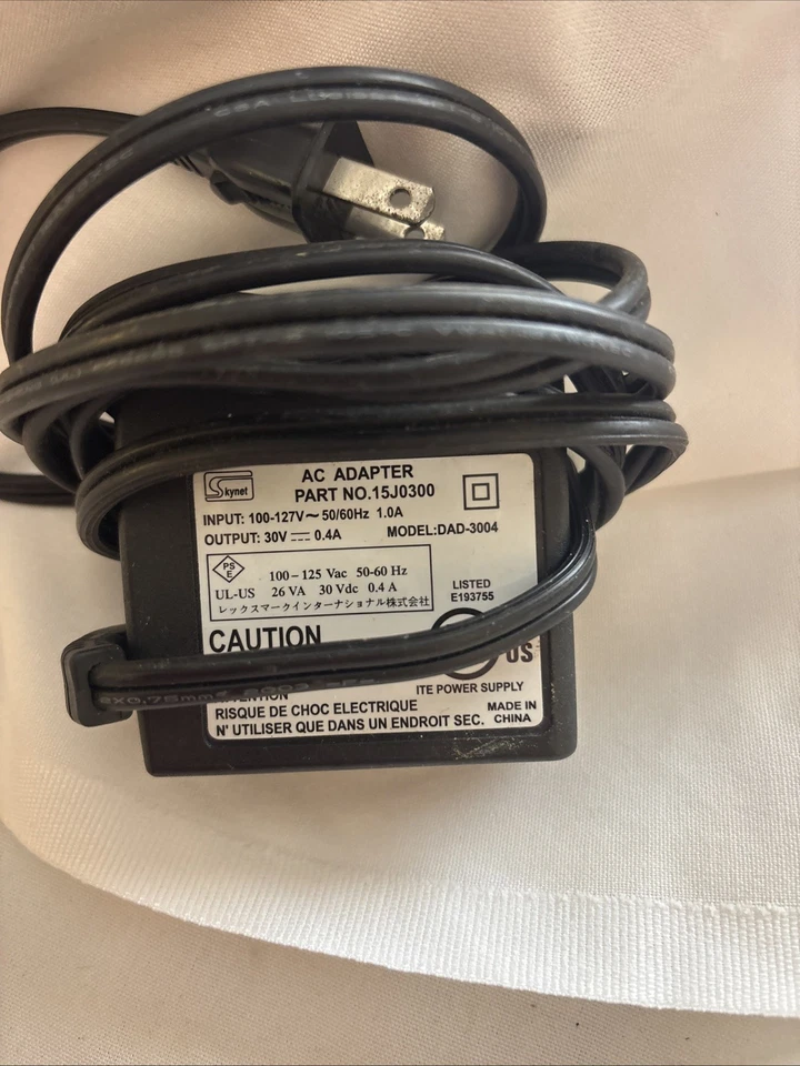 Skynet | P/N:15J0300 | Modelo: Adaptador de corriente alterna DAD-3004 Impresora Lexmark (no probada) Foto 1 de 2