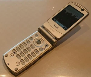 Final Fantasy Docomo Foma P900i PINK silver Vii Phone With chargr - Picture 1 of 7