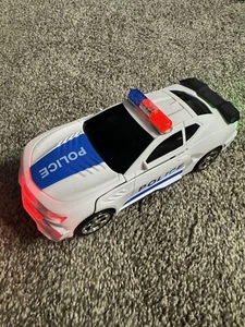 Roboter Transformator Actionfigur elektrisches Licht Musik Polizei Rennen Auto Junge Kind Spielzeug - Bild 1 von 6