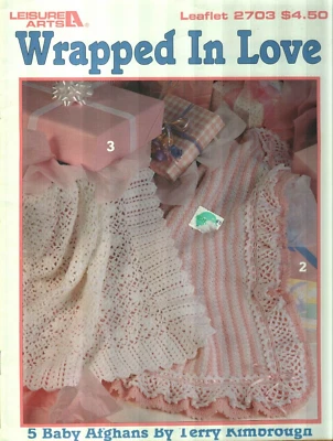 USED WRAPPED IN LOVE BABY AFGHANS 5 DESIGNS LEISURE ARTS CROCHET PATTERN BOOK - Image 1 of 4