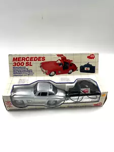 Modellauto Mercedes 300 Sl Dickie silber mit Fernsteuerung Vintage Neu - Bild 1 von 3