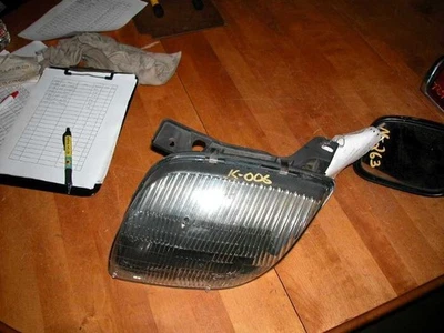 95-02 Pontiac Sunfire Left Driver Headlight Lamp - Image 1 of 2