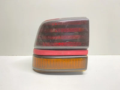 Luz trasera izquierda Pontiac Sunbird 1988-1991 montada en QTR OEM 166-01340 Foto 1 de 4