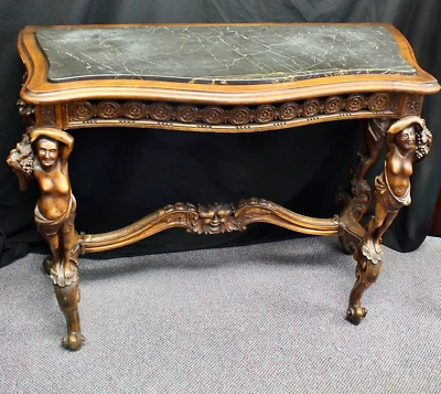 Antigua mesa tallada con tapa de mármol de salón/consola/biblioteca. Cariátides en 4 esquinas. Foto 1 de 4