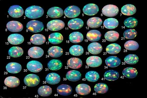 Natural AAAA Flashy Multi Fire White Ethiopian Opal Oval Shape Cabochon - Picture 1 of 283