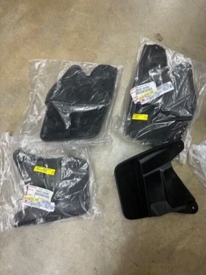 NEW OEM 2022-2023 TOYOTA TUNDRA MUD GUARDS - Image 1 of 4