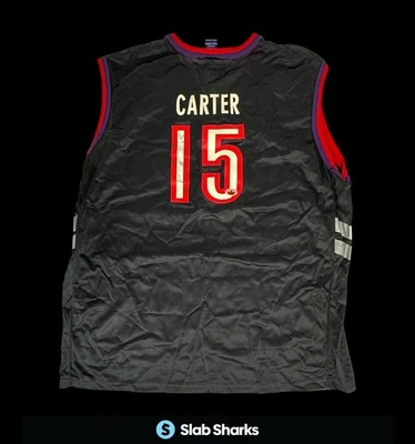 JERSEY FLEER LEGACY VINCE CARTER TORONTO RAPTORS CHAMPS VINTAGE PÚRPURA AUTOMÁTICO/750 Foto 1 de 4