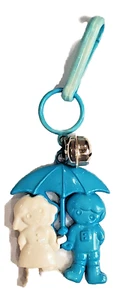 Vintage 1980s  Boy and Girl Under an Umbrella Plastic Clip Bell Charm - Picture 1 of 1