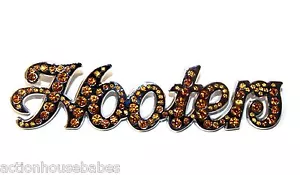 HOOTERS SILVER ORANGE RHINESTONES HOOTERS NAME 3 1/2" LAPEL PIN BUTTON - Picture 1 of 2