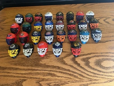Set of 29 Franklin Mini Goalie Hockey Masks Franklin NHL helmets. EXCELLENT!! - Image 1 of 4