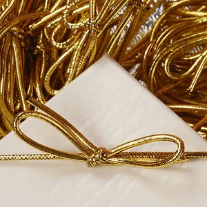 10 Inch Gold Metallic Stretch Loops With Bow (442910AP) - See Avail Qtys - Picture 1 of 1