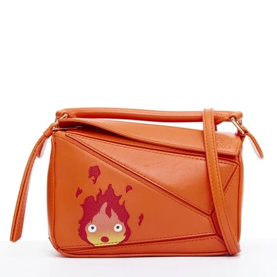 LOEWE Howls Moving Castle Puzzle Calcifer orange mini puzzle bag - Image 1 of 4
