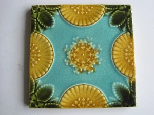 ANTIQUE 6" MOULDED & MAJOLICA GLAZED TILE - TURQUOISE /GOLD /GREEN - CORN BROS? - Picture 1 of 2