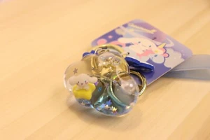 Sanrio-Cinnamoroll Schlüsselanhänger schwimmend in der Flasche Cloud Style mit Liquid - Bild 1 von 4