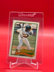 1989 Topps Traded #48T  Rickey Henderson - Picture 1 of 2