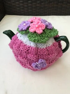 HAND KNITTED BASKET WEAVE TEA COSY FLOWERS BUTTERFLY FOR A SMALL TEAPOT 1-2 CUP - Picture 1 of 6