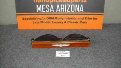 Cadillac Fleetwood Brougham 1980-1989 tracción trasera LH ámbar montaje de lámpara de estacionamiento Foto 1 de 4