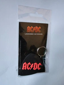 AC DC PLECTRUM RUBBER KEYRING NEW  SEALED - Picture 1 of 1