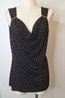 Top de mujer White House Black Market talla S sin mangas con tachuelas estampado animal Foto 1 de 4