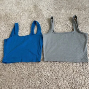 Juego de 2 camisetas sin mangas acanaladas con cuello cuadrado pequeño talla Holister para mujer - Imagen 1 de 16