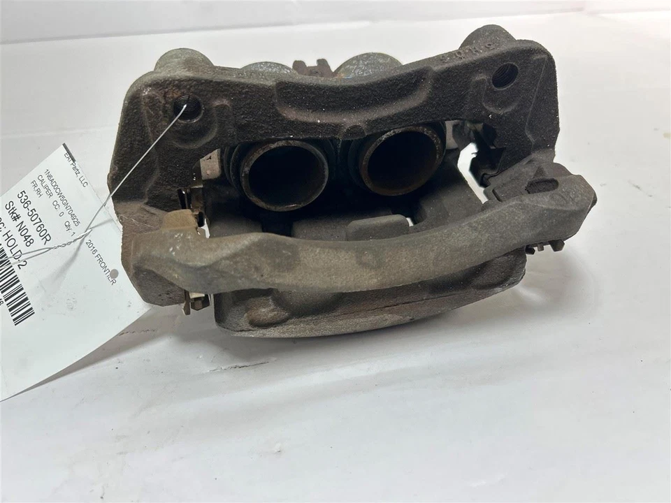 Pinza de freno delantera Nissan Frontier 2008-2023 pasajero 41 k millas OEM Foto 1 de 4