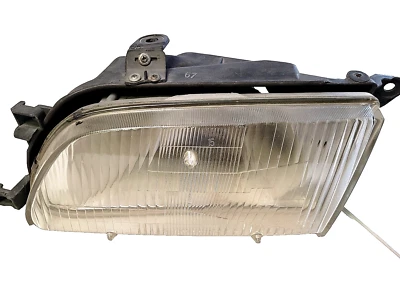 Faro lateral izquierdo izquierdo del conductor Toyota Tercel 1996 a 1997 OEM Koito 110-76087 L Foto 1 de 3