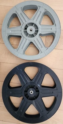 Carretes de película de plástico vintage Plio Magic 35 mm 14-3/8" negro y gris Foto 1 de 3