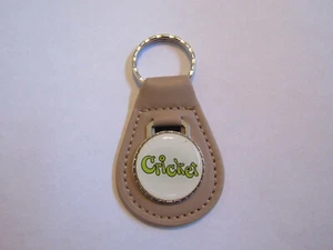 1971 1972 1973 1974 1975 PLYMOUTH CRICKET EMBLEM LOGO KEYCHAIN KEYRING BEIGE - Picture 1 of 2