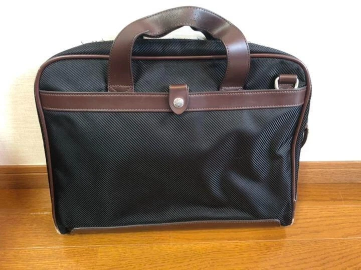 FILSON MALETÍN BOLSO PARA PORTÁTIL NEGRO PC Resistente Sarga Nylon Cuero Logo Raro Foto 1 de 4