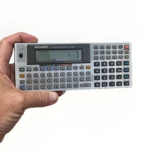 Calculadora de computadora de bolsillo Sharp PC-1460 como nueva - Imagen 1 de 9