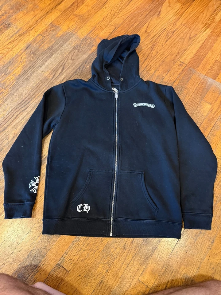 parche cruzado corazones cromados cremallera Foto 1 de 4