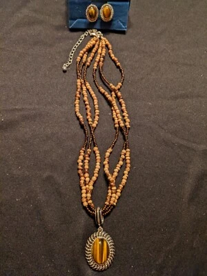 Juego de colgantes y pendientes ojo de tigre Avon Foto 1 de 4